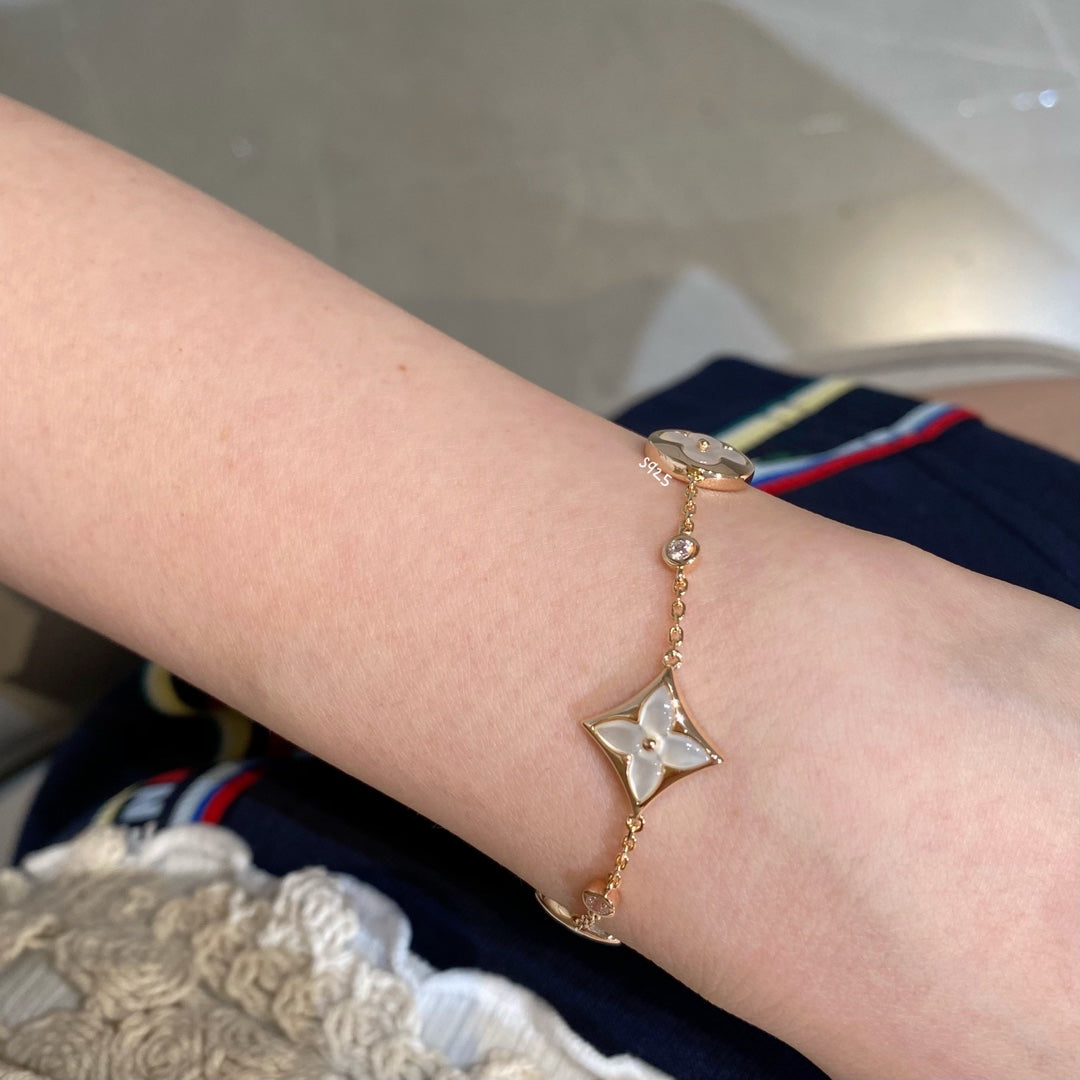 ¡®AuraJewelry¡¯STAR AND SUN 4 MOTIF WHITE MOP PINK GOLD BRACELET