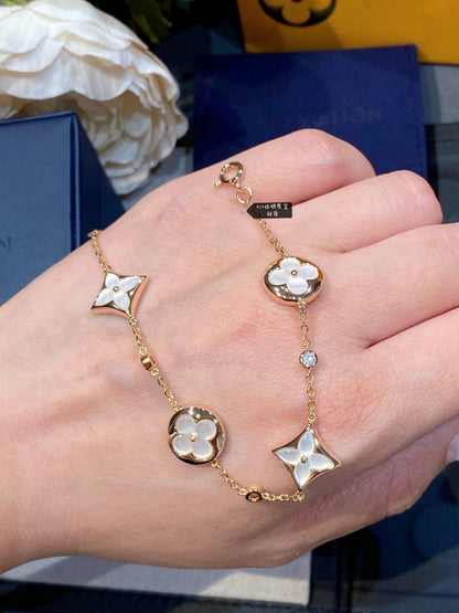 ¡®AuraJewelry¡¯STAR AND SUN 4 MOTIF WHITE MOP PINK GOLD BRACELET