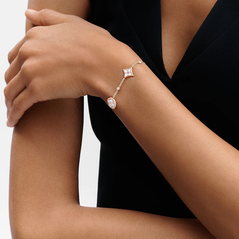 ¡®AuraJewelry¡¯STAR AND SUN 4 MOTIF WHITE MOP PINK GOLD BRACELET